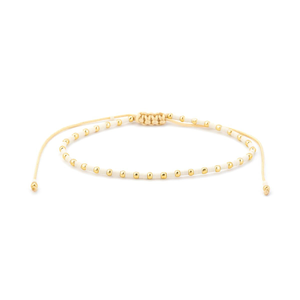 Pulsera acabado oro amarillo de 18k y Resina Crema - Uky