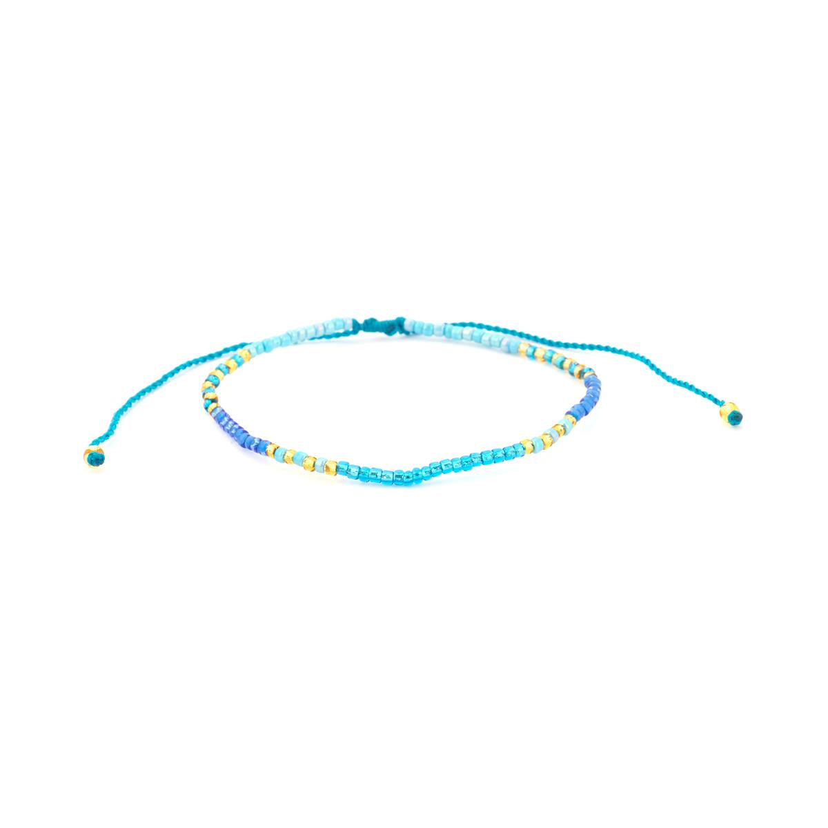 Pulsera acabado oro amarillo de 18k y Resina Azul - Lisira