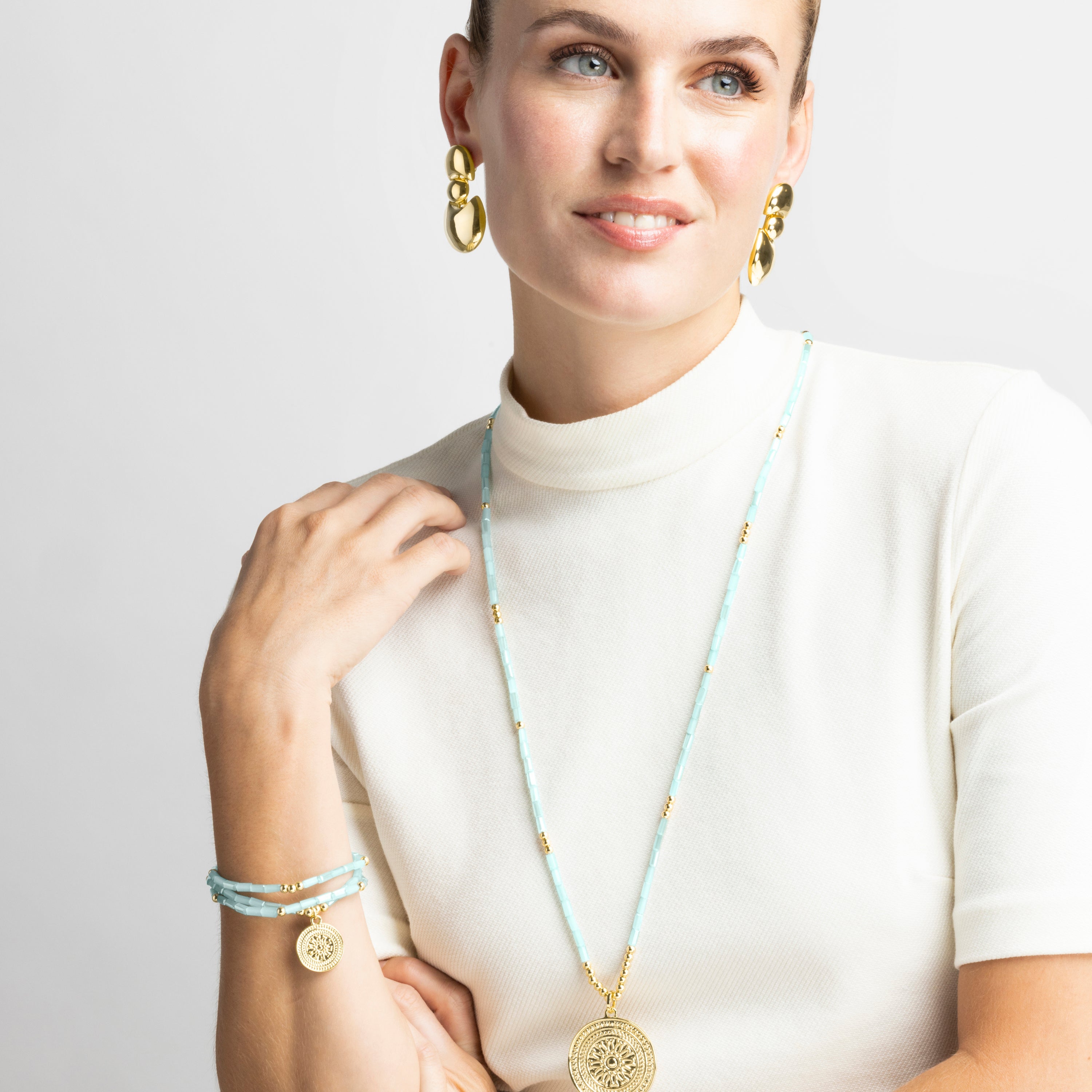 Pulsera con Cristal Azul acabado oro 18k - Thyu