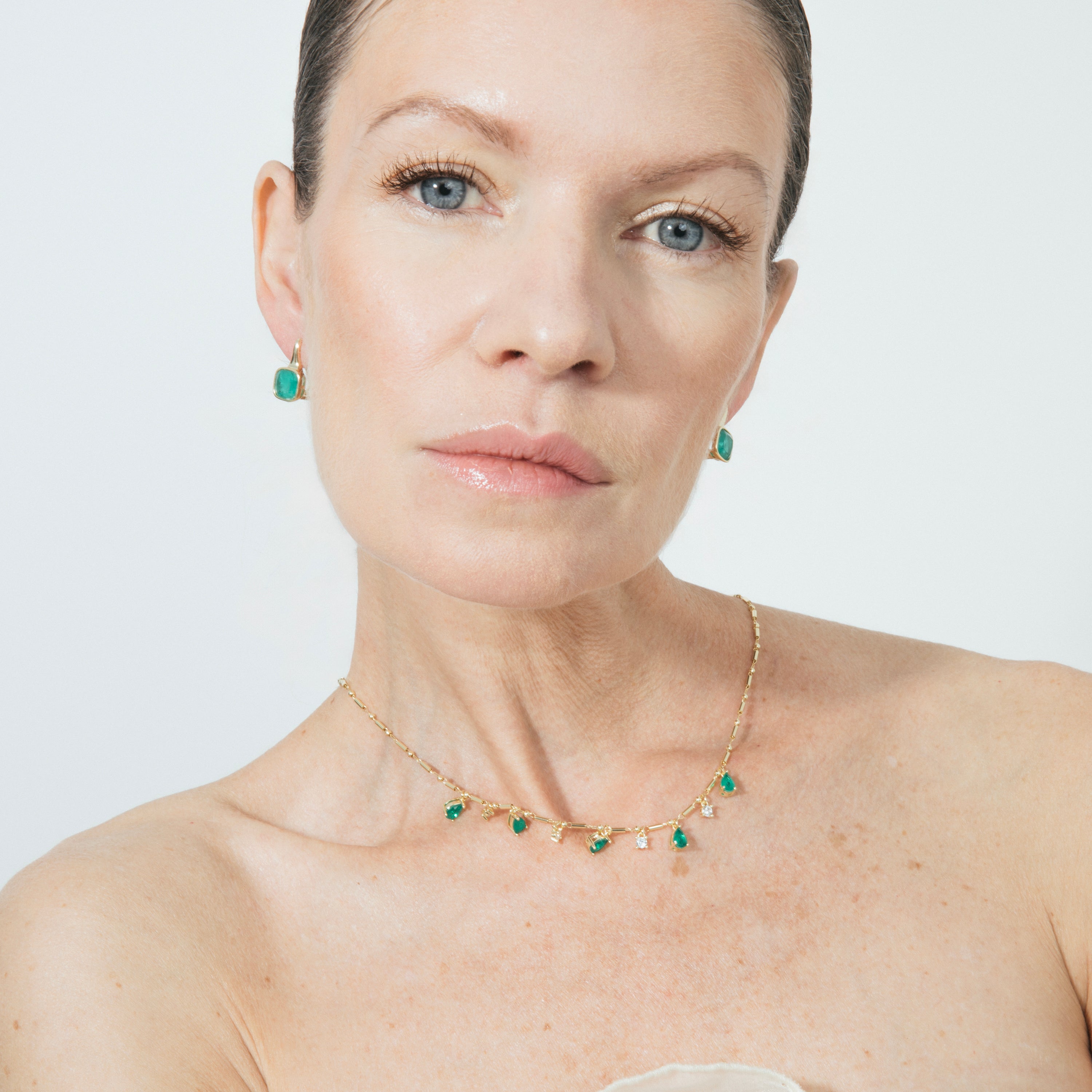 Pendientes de Plata de Ley 925 y Cuarzo Hidrotermal Verde Paraiba acabado en oro amarillo 18k - Derly