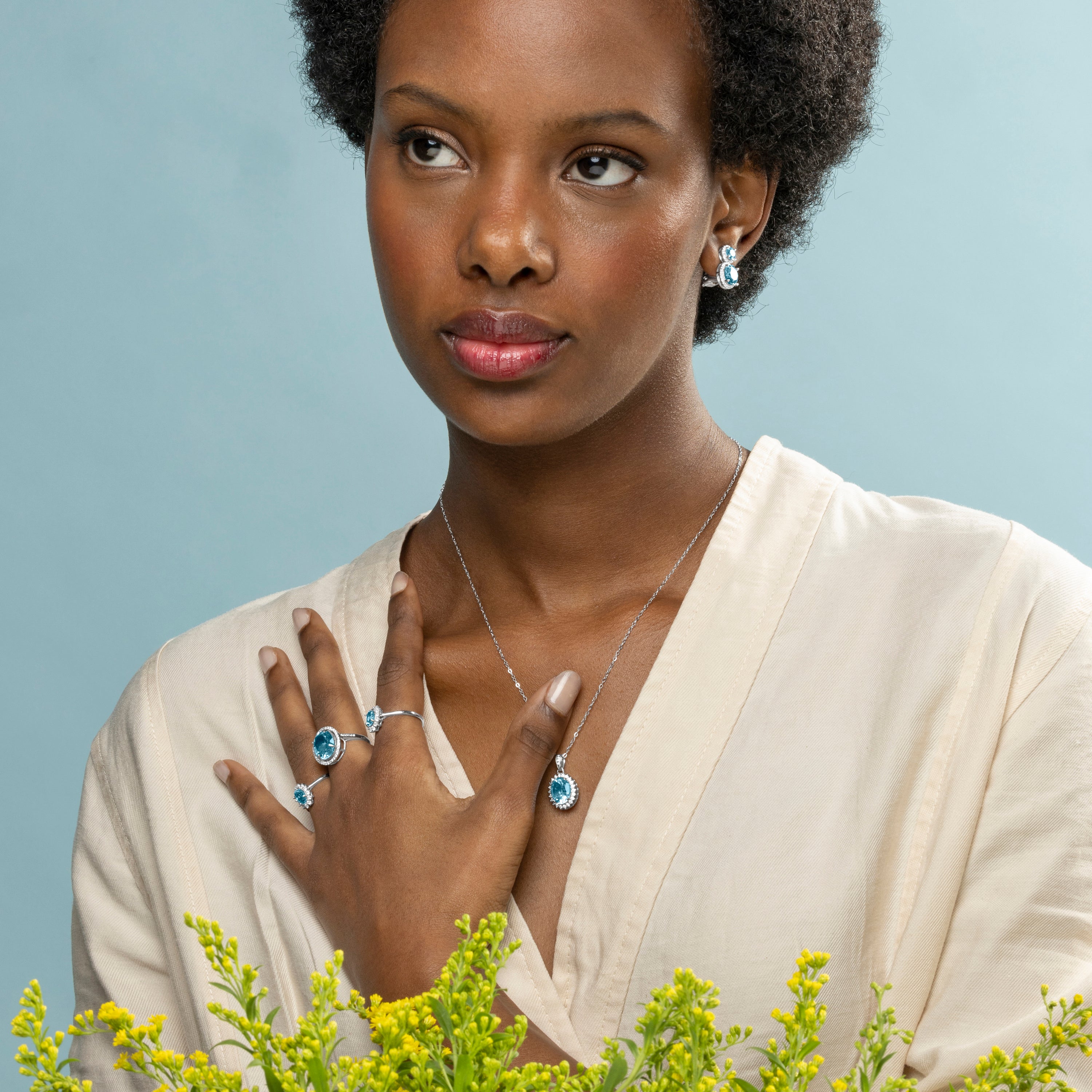 Anillo de Plata de Ley 925 con Topacio Azul Natural acabado en rodio - Lirian