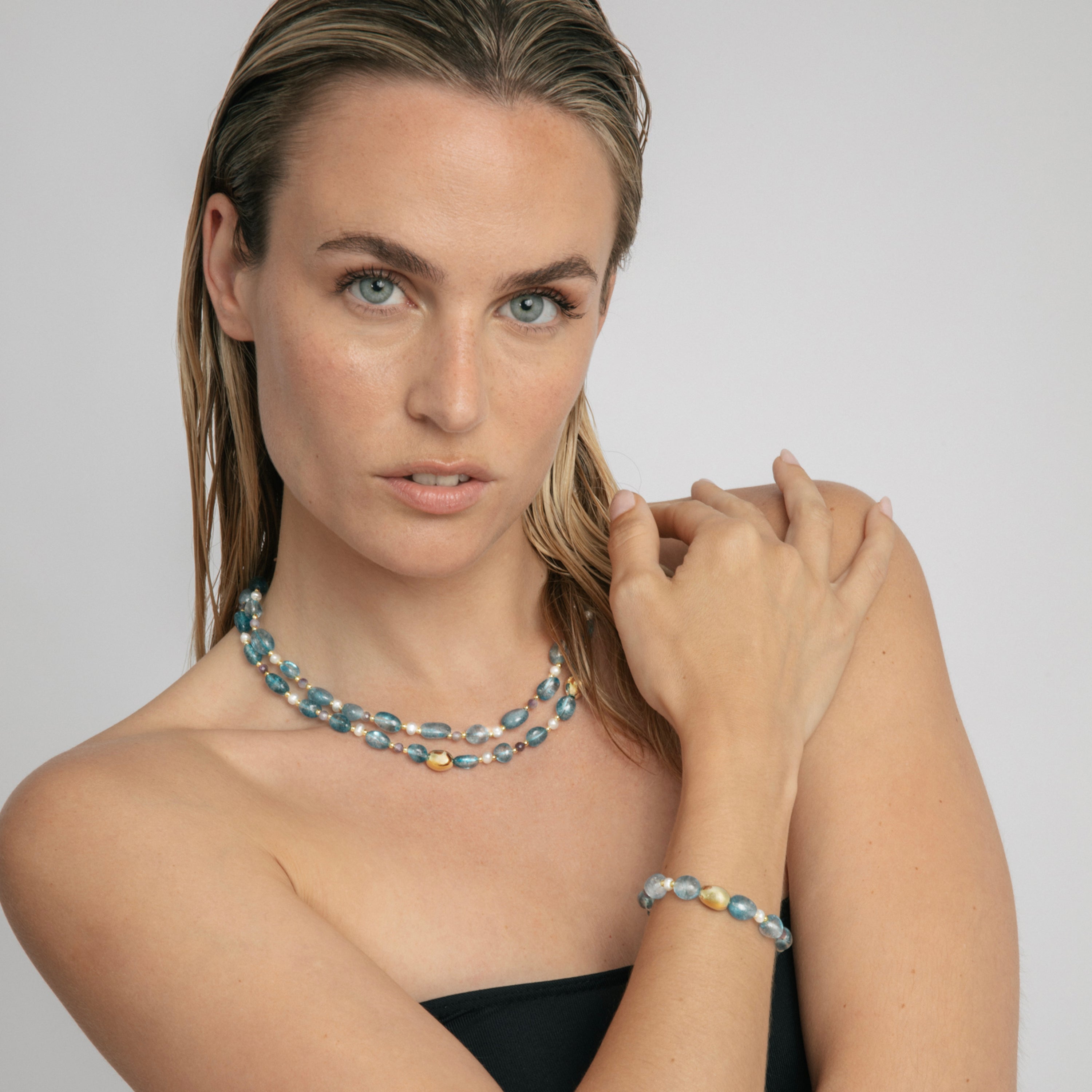 Collar de Plata de Ley 925 y Cristal Azul acabado en oro amarillo 18k - Aswudi