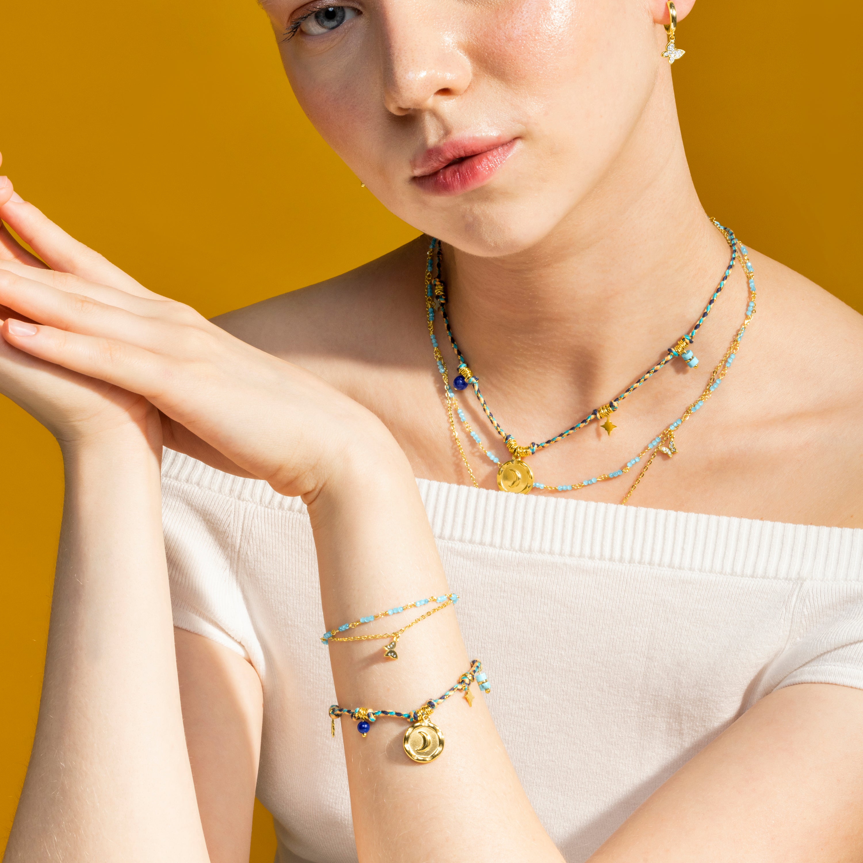 Pulsera con Cristal Azul Oscuro acabado oro 18k - Liskel